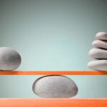 SMBs and corporate giants represented by balanced stones